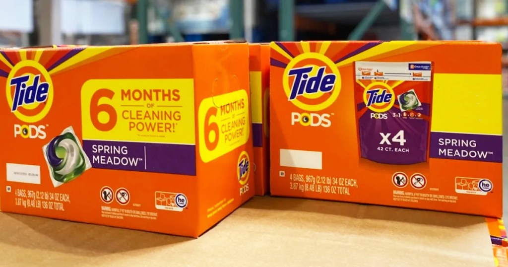 large orange boxes of tide pods in spring meadow scent