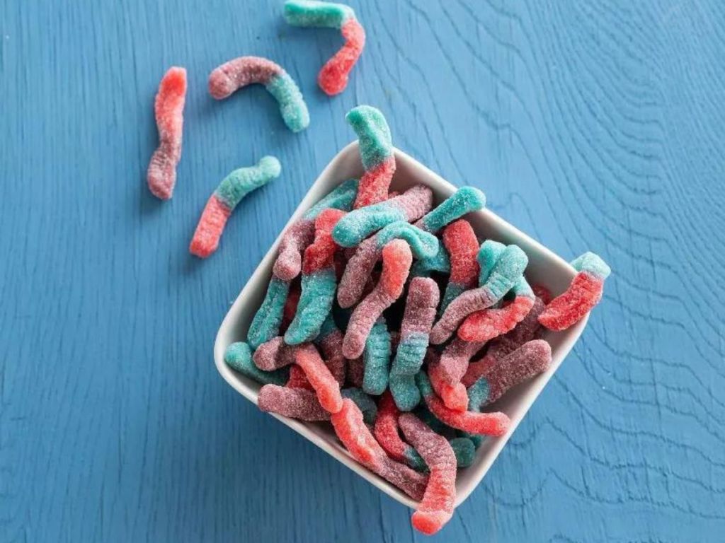 A bowl of Trolli Sour Brite Gummy Worms