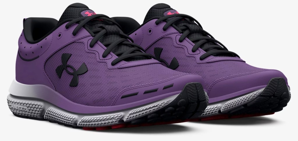 pair of purple under armour running shoes
