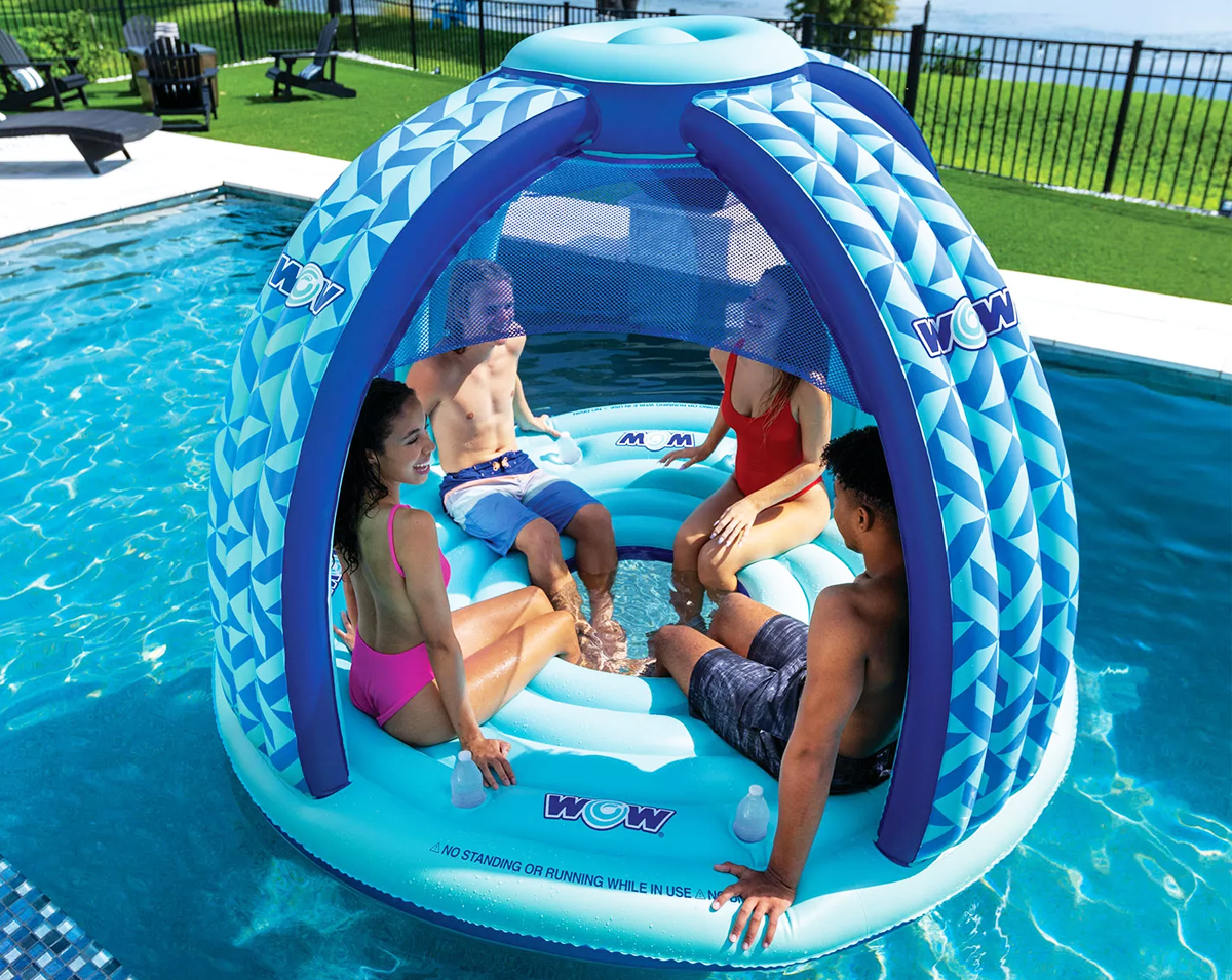 Four kids inside a floating canopy