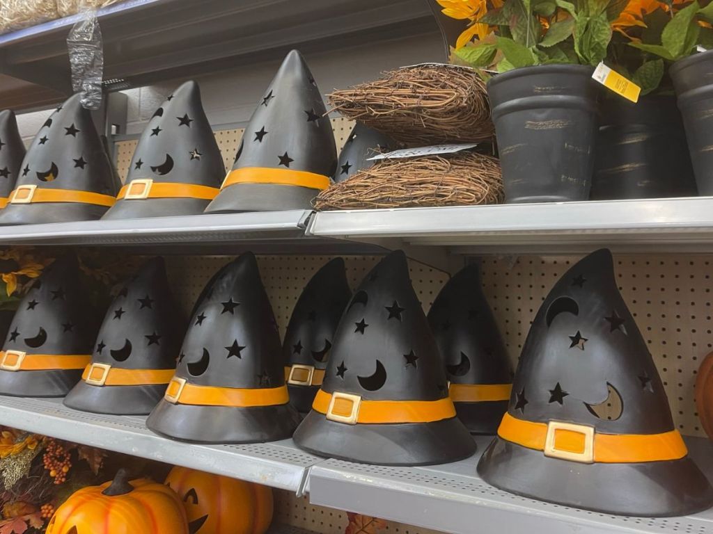 Shelves of Ceramic Witch hat lantern decorations at Walmart