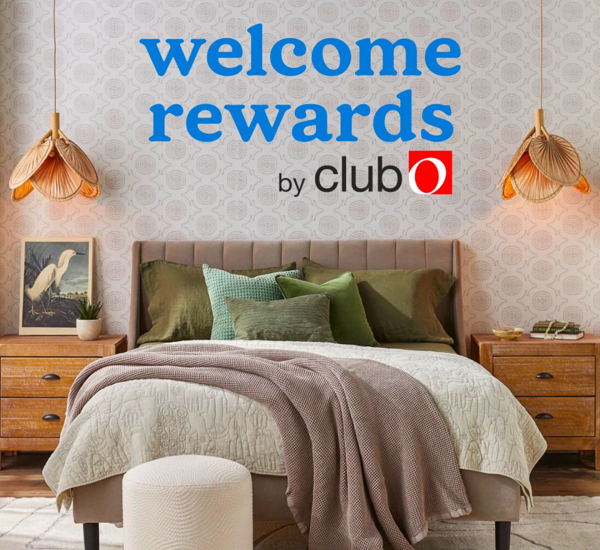 an image of a bed set up in a room with night tables and an ottoman at the foot of the bed with Welcome rewards club O in text across the top of the image
