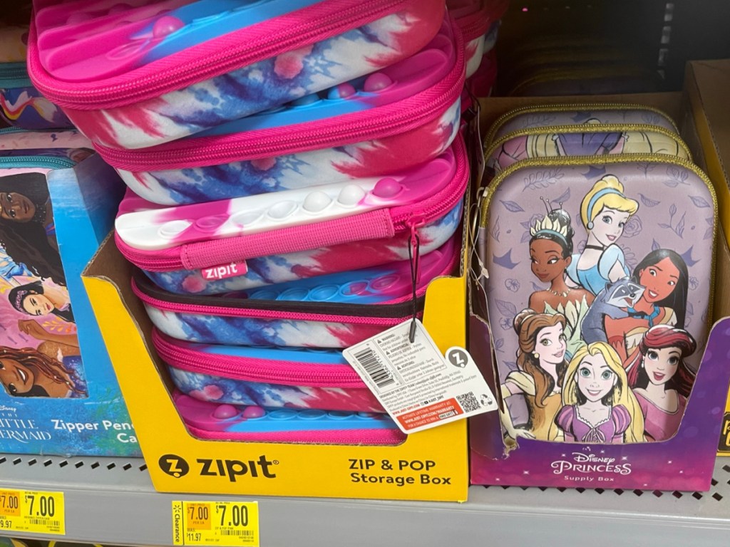 ZIPIT ZIP & POP New Pencil Box displayed at the store next to princesses cases