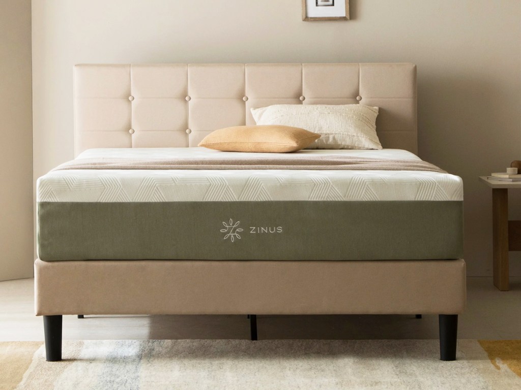 zinus mattress on a cream frame with matching headboard