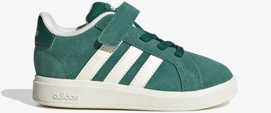 green suede sneaker with 3 white stripes and velcro strap