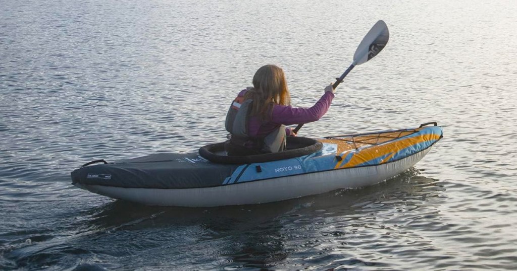 woman kayaking in lake