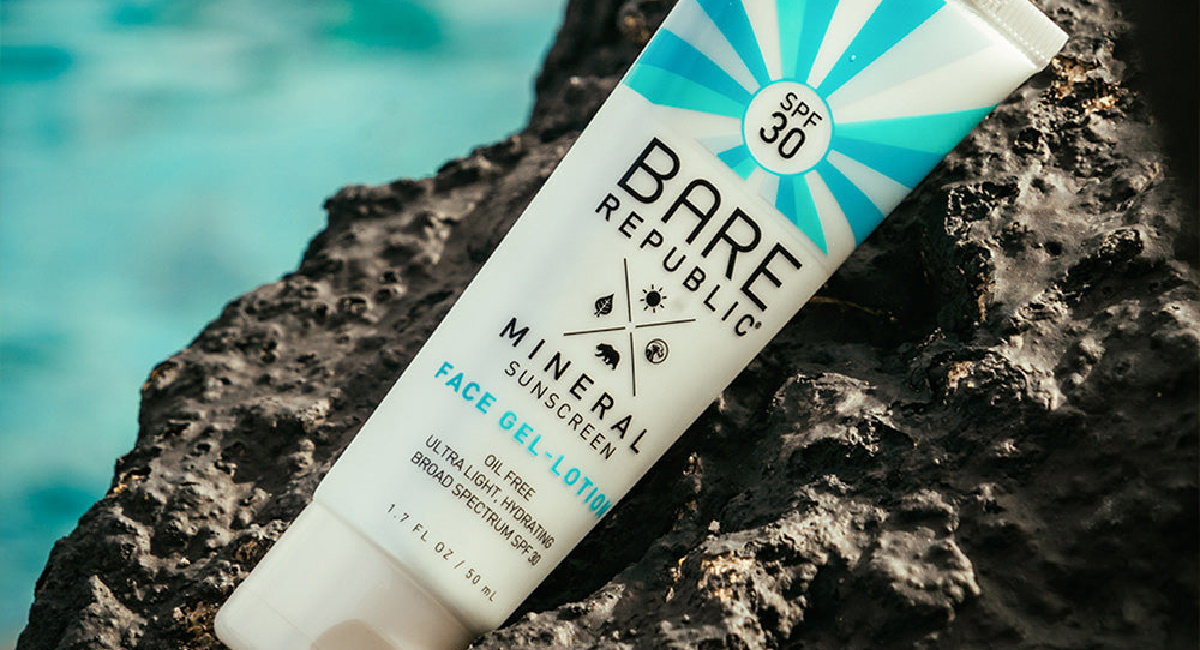 bare republic mineral sunscreen displayed on a. rock