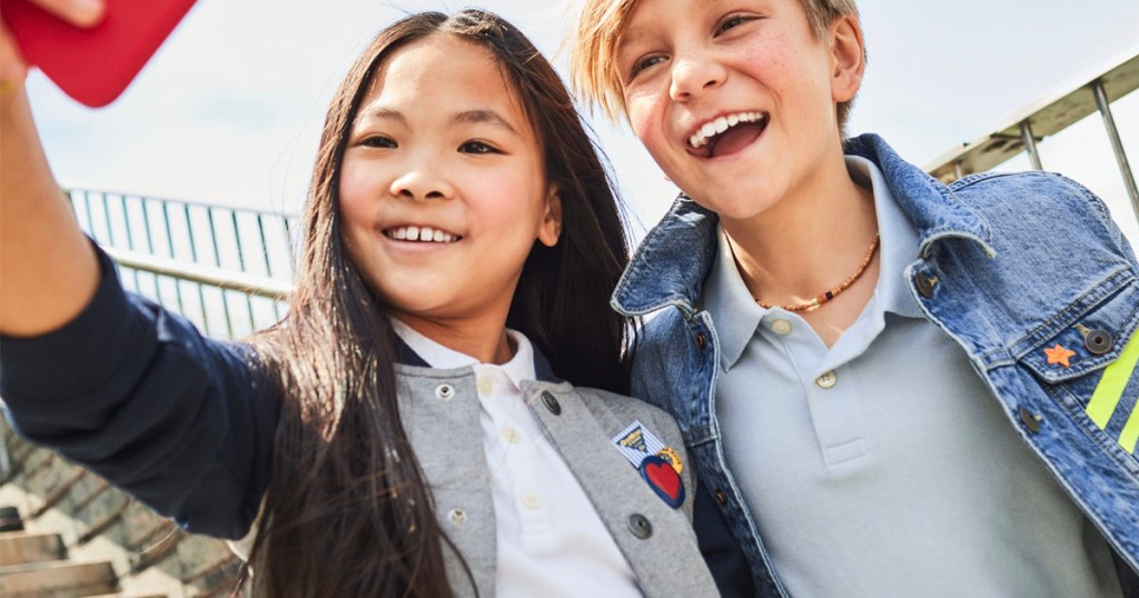 girl and boy wearing white and blue school uniform polos