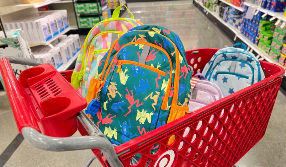 target shopping cart filled with cat and jack backpacks