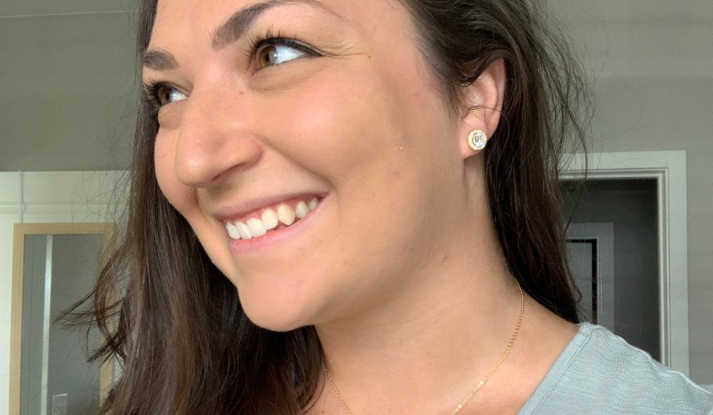 woman wearing stud earrings