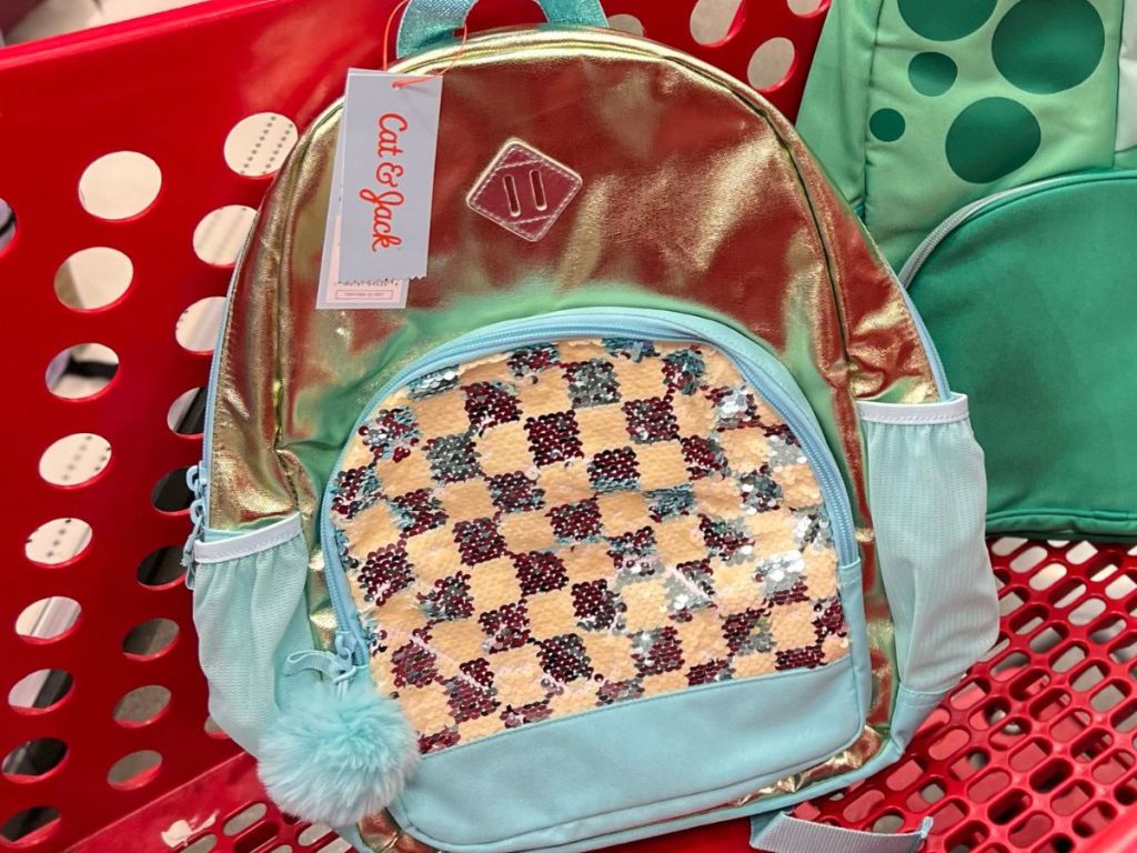 blue and gold sequin checkered backpack in target shopping cart