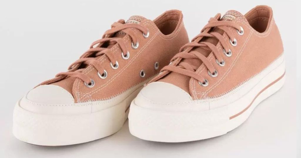peach converse shoes and white soles