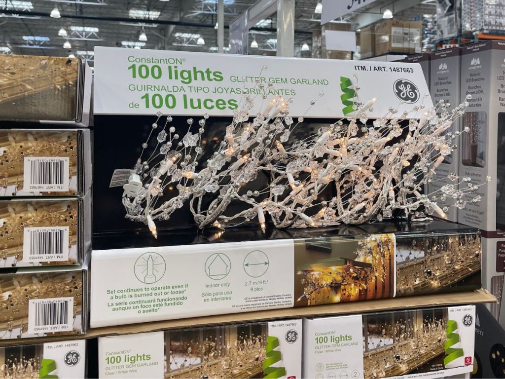 boxes of GE 9’ Glitter Gem Garland in store