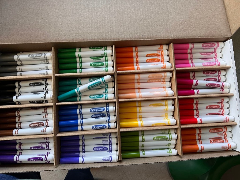 open box containing class set of markers