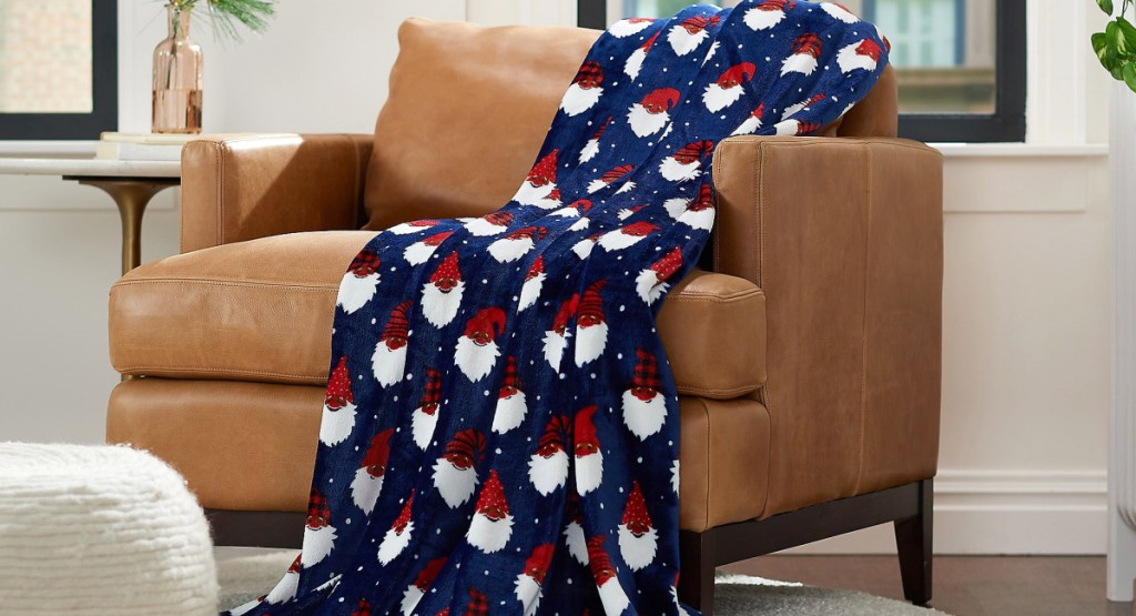 festive throw blanket on a chair displayed