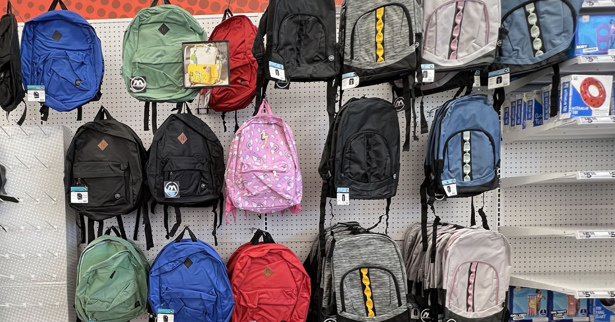 lots of backpacks hanging in store