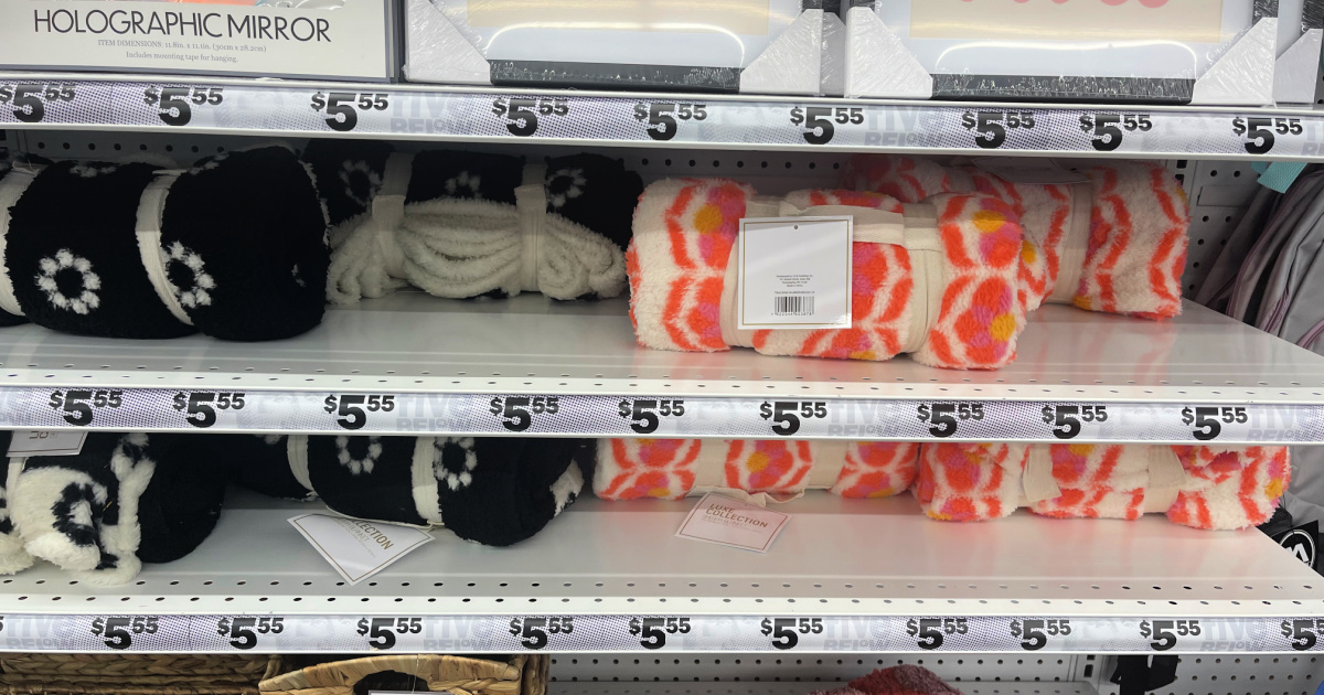 rolled up sherpa blankets on a shelf at five below