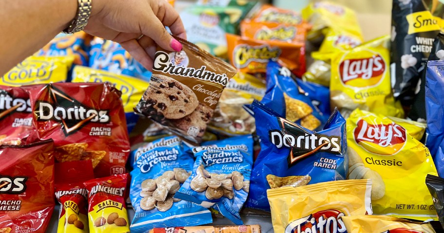 hand picking up cookie bag