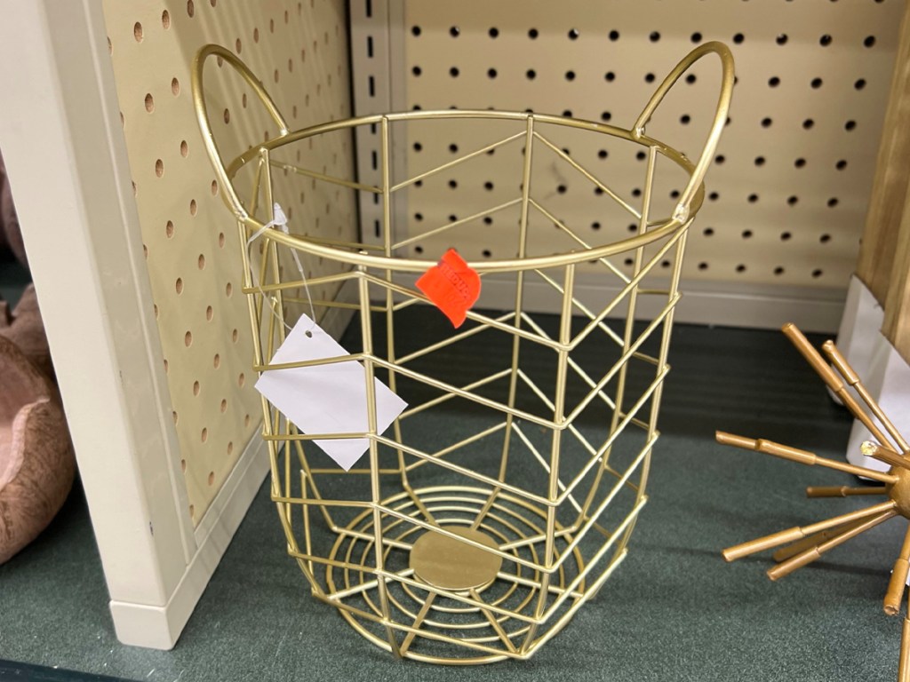 gold wicker basket on shelf at hobby lobby