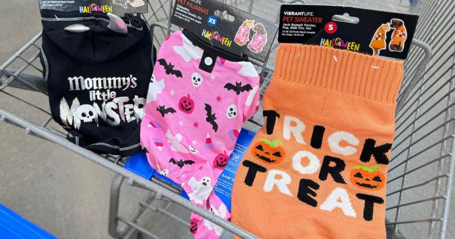 halloween dog clothes in cart in store