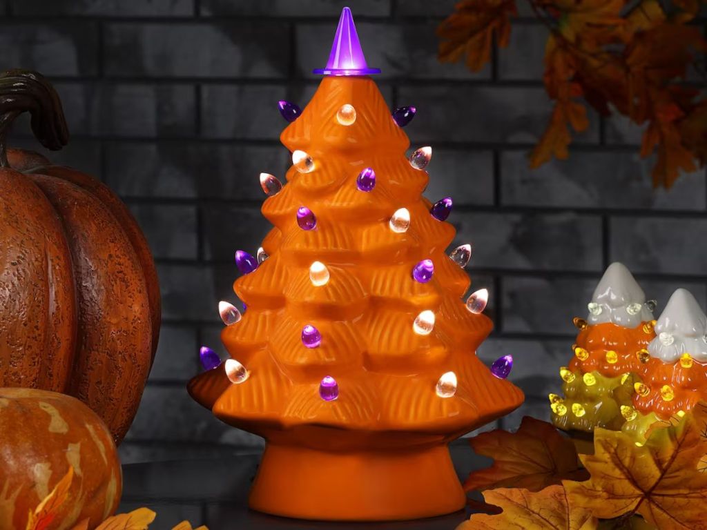 orange ceramic tree with purple witch hat tree topper