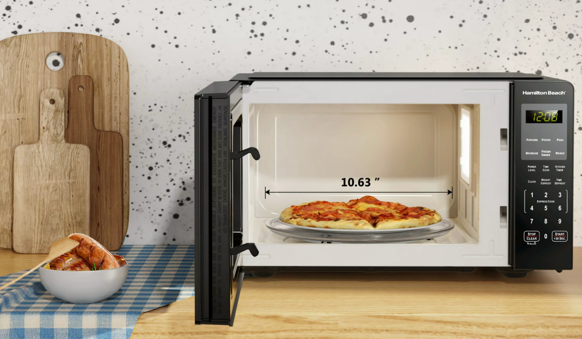 microwave with door open and food inside
