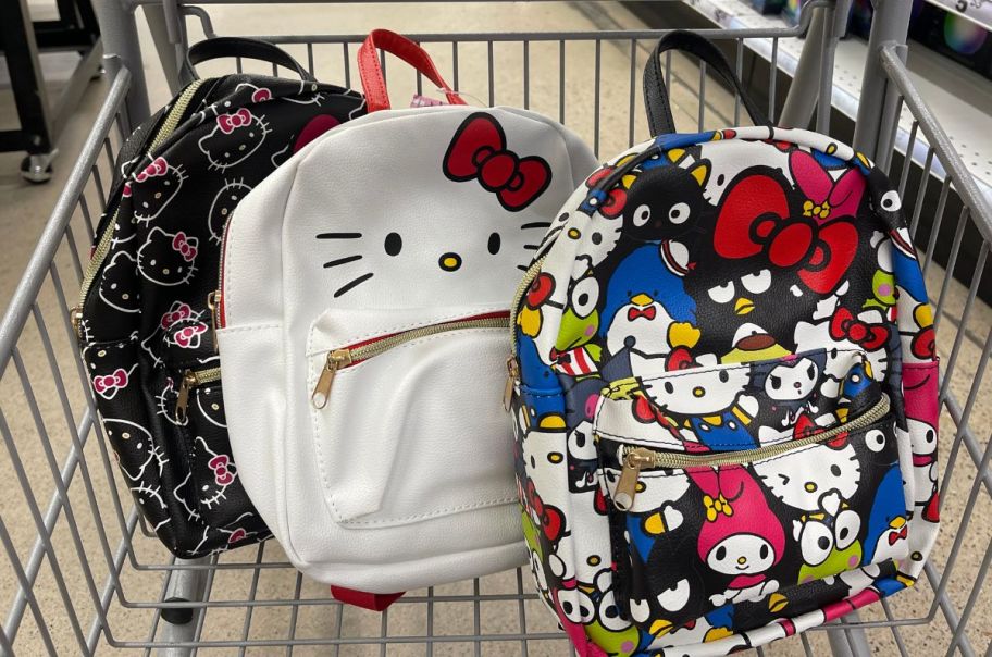 three hello kitty mini backpacks in a five below shopping cart