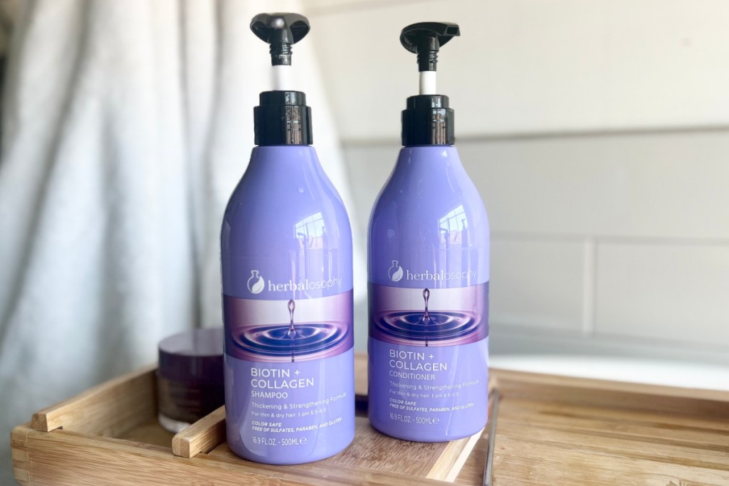 purple shampoo and conditioner bottles w/ pump