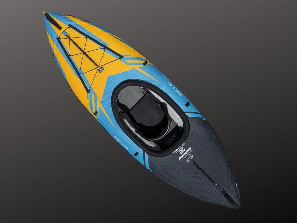 yellow blue and black kayak