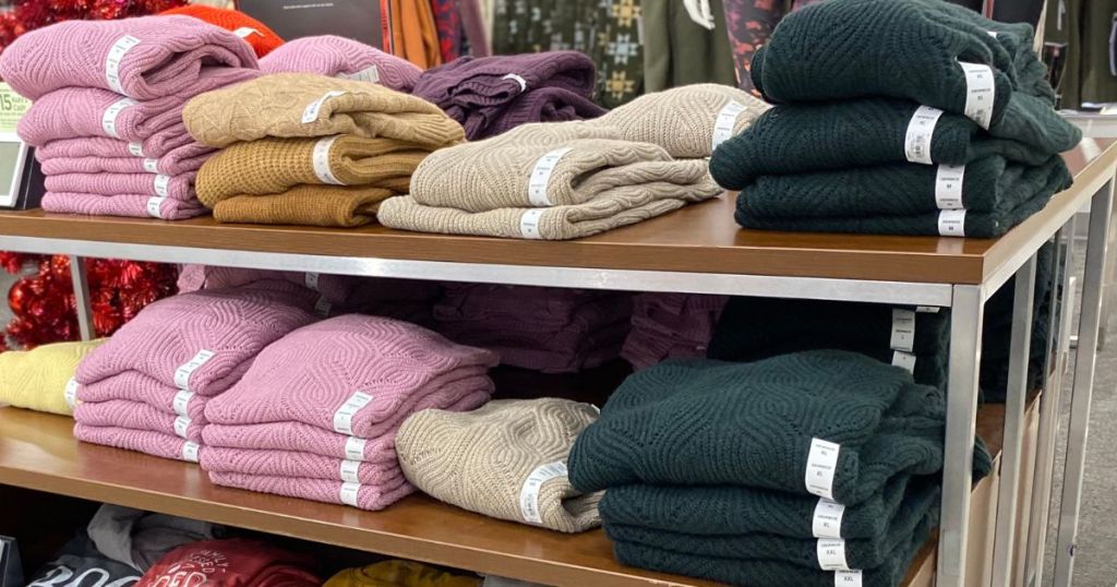womens sweaters on display in store