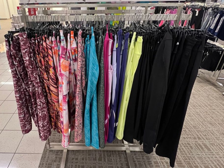 women's leggings and activewear pants on a rack