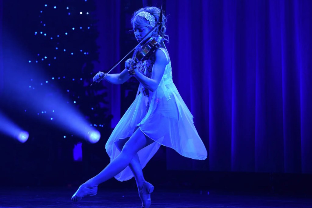 lindsey stirling performing on stage