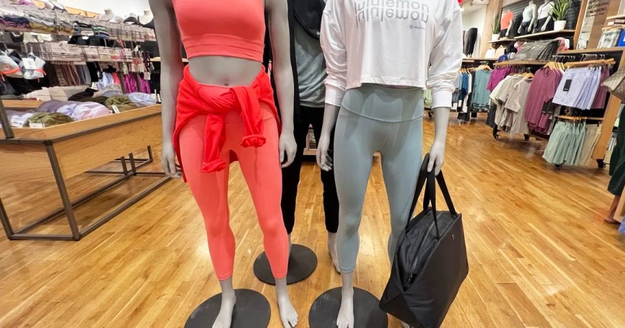 mannequins wearing lululemon clothing in store