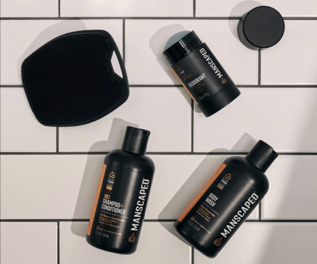 mens body care products on subway tile