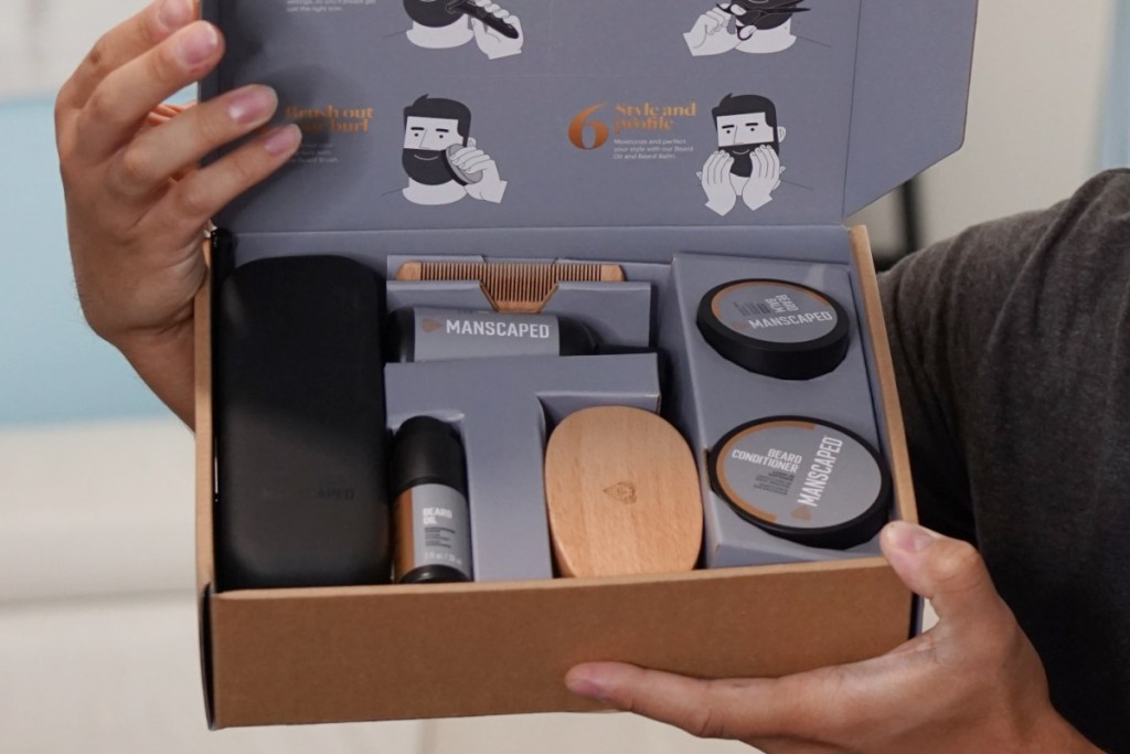 hand holding box of shaving tools open