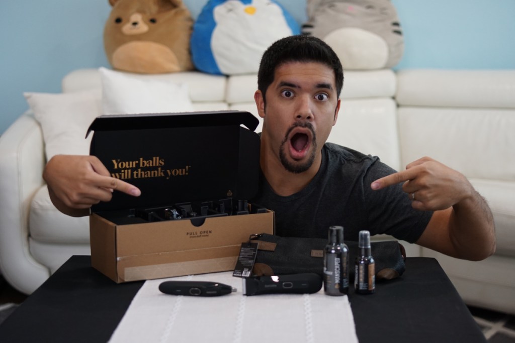 man with surprised face and manscaped items