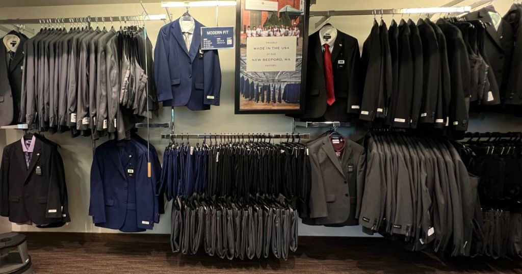 sport coats and suit separates hanging in store