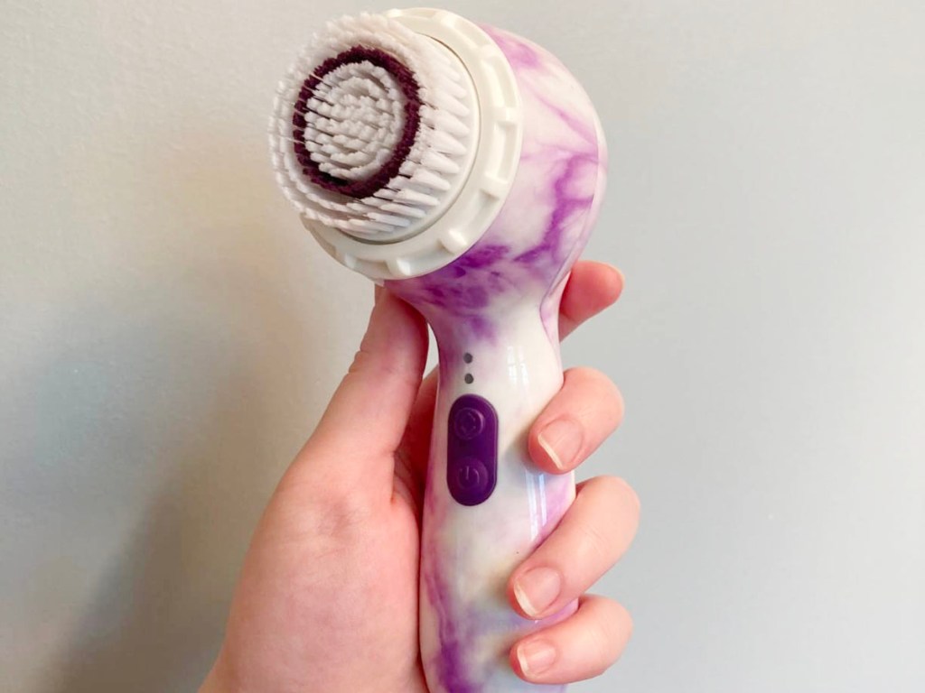 hand holding michael todd beauty tool