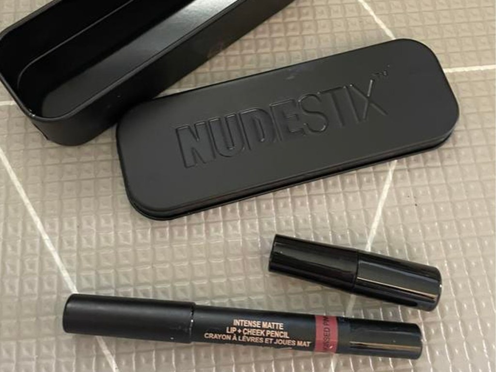matte nudestix lip color sitting on table