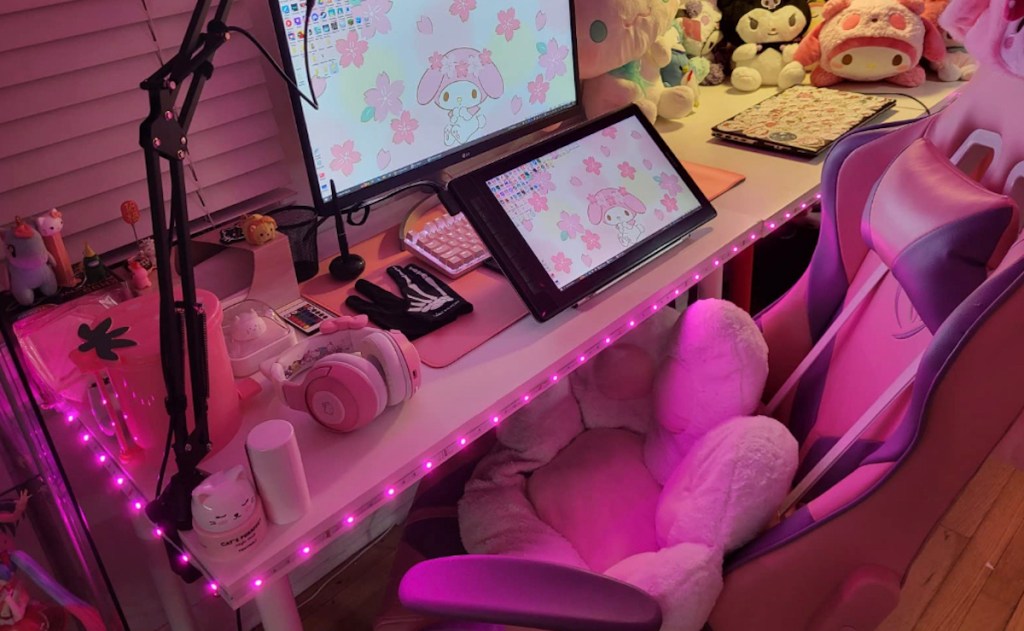 pink strip lights on teen girl desk with chair in bedroom