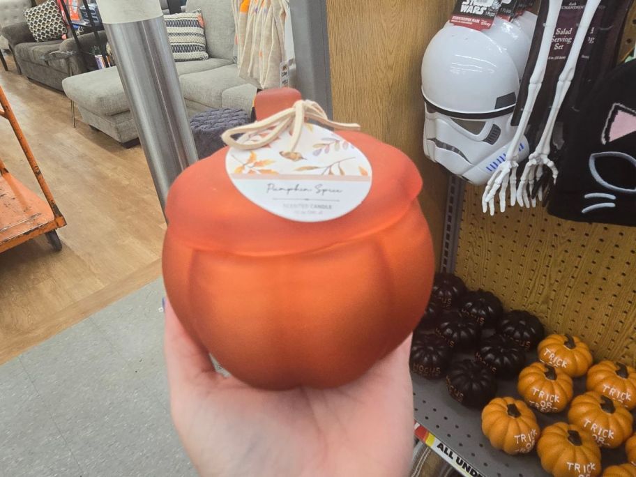 Autumn Comfort Pumpkin Spice Scented Candle in hand in store