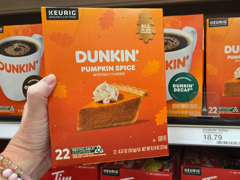 Dunkin' Donuts Pumpkin Spice Flavored Medium Roast Coffee Pods 22-Count box in hand in store
