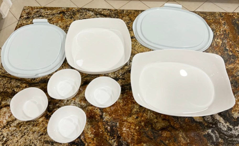 rubbermaid white bowls and lids sitting on countertop