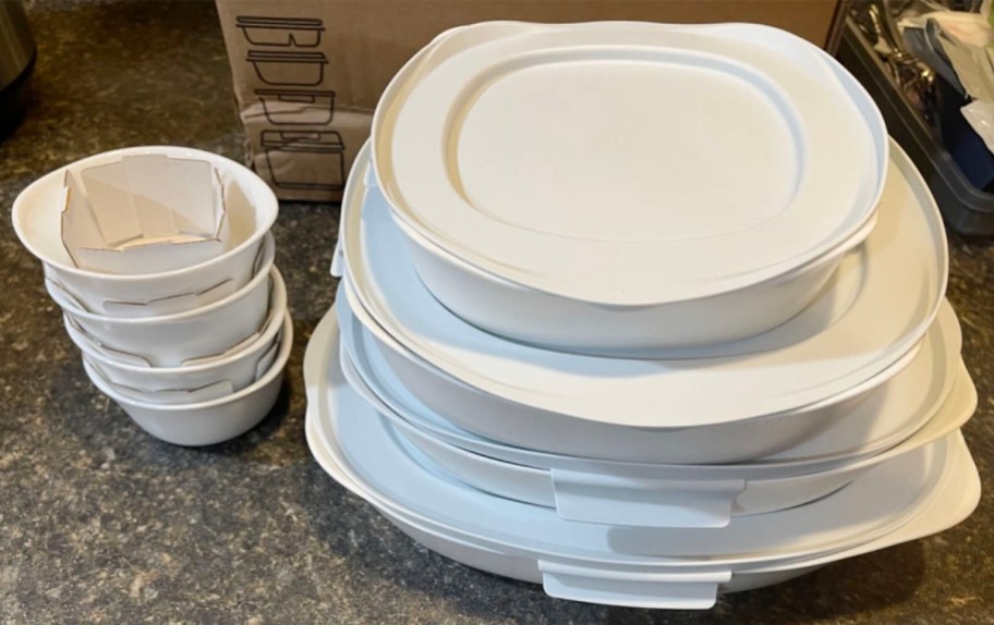 rubbermaid white duralite baking sets stacked with 4 bowls on the side on countertop