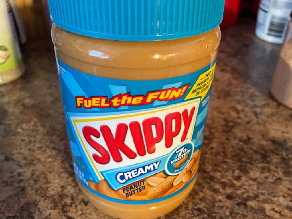 jar of Skippy peanut butter on counter