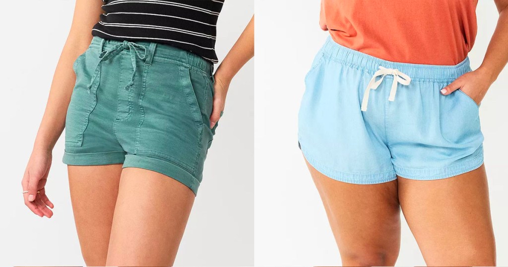 two women wearing green and blue shorts