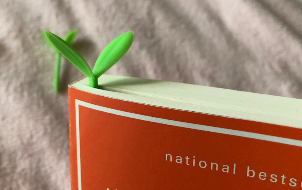 sprout bookmark coming out of the top of book