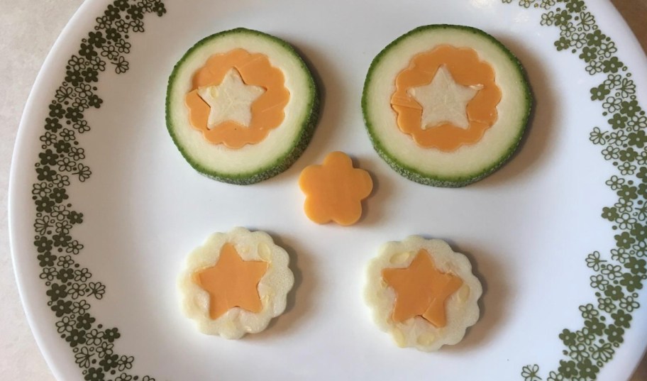 star shaped cucumber and cheese food on plate