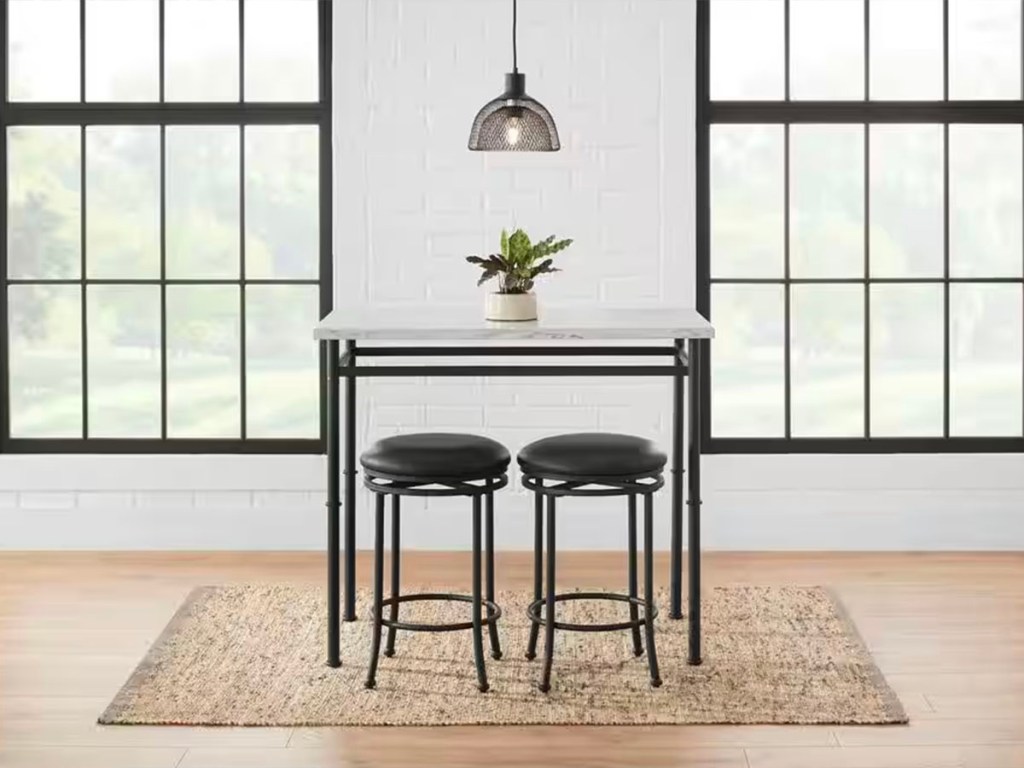 dining table with two stools