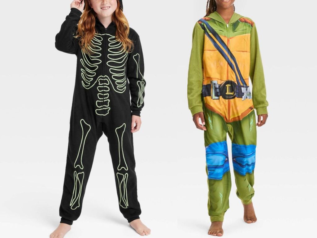 girl wearing skeleton onesie and girl wearing TMNT onsie